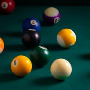 billiard balls on billiard table