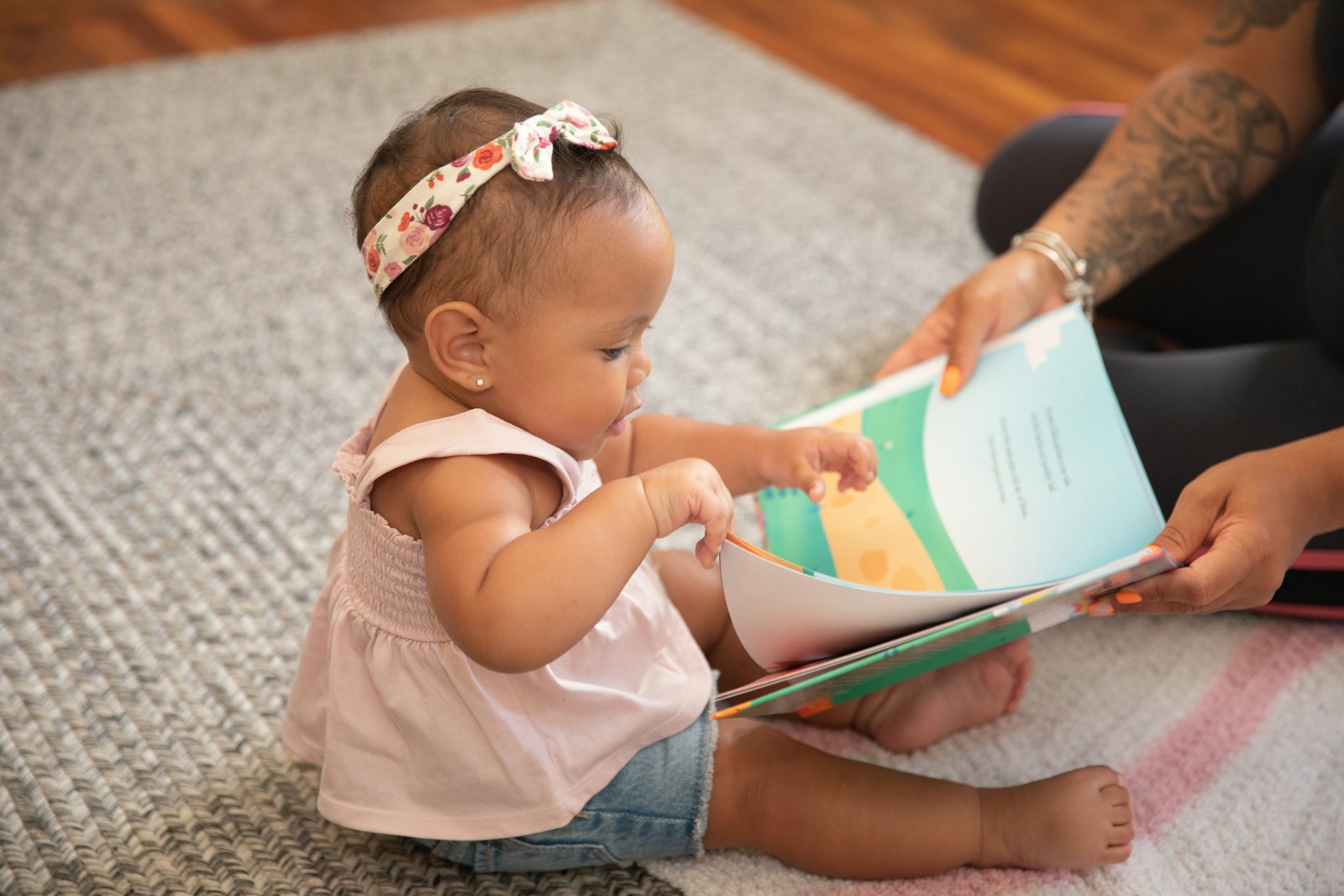a baby reading a book